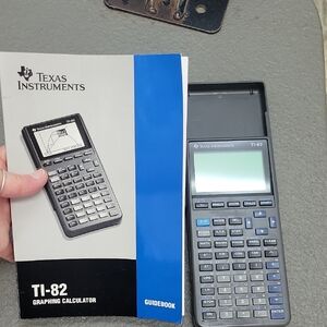 Texas Instruments TI-82 Graphing Calculator with Blue and Black Design